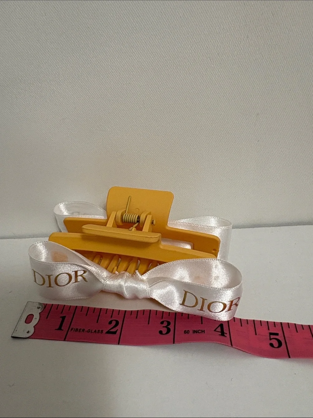 Dior Luxurious white and Gold Ribboned Hair Clip